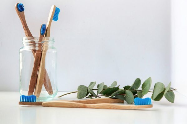 Calming apothecary setting with amber tincture bottles and serene botanical leaves