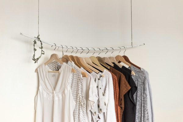 Minimalist capsule wardrobe aesthetic with tailored neutral coats and refined essentials