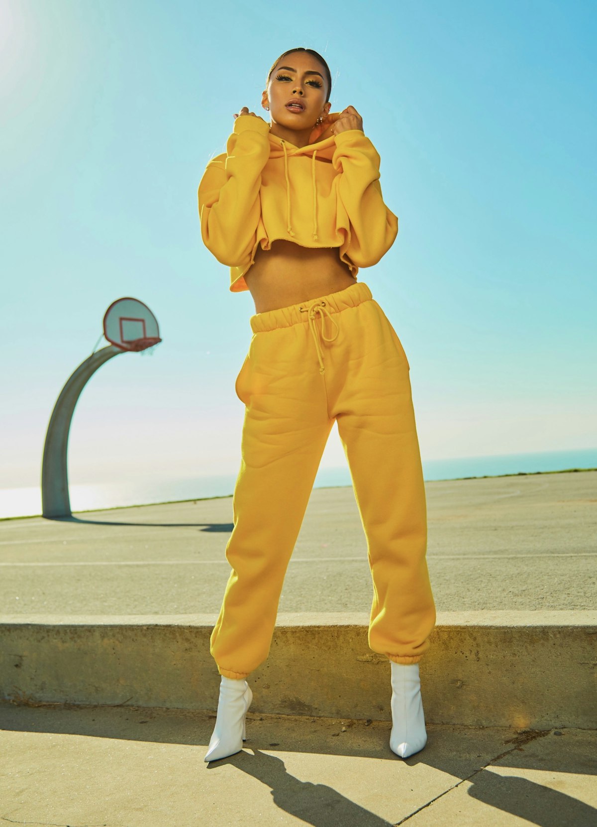 High-fashion outerwear editorial featuring double-faced wool coat and tailored silhouette